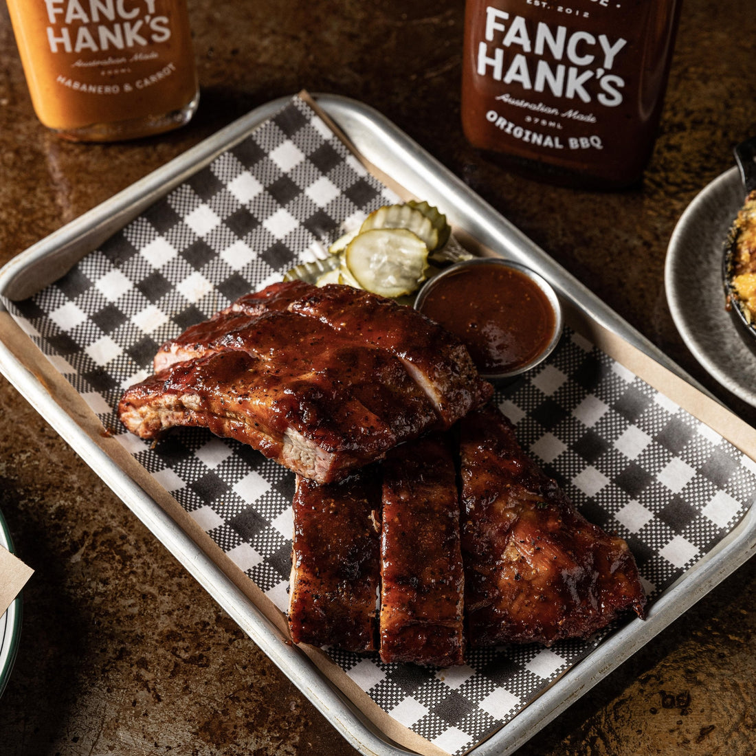 Oven-Baked Baby Back Ribs with Fancy Hank’s BBQ Sauce